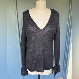 Lewit metallic shimmer v-neck sweater with bow cuffs - size XS